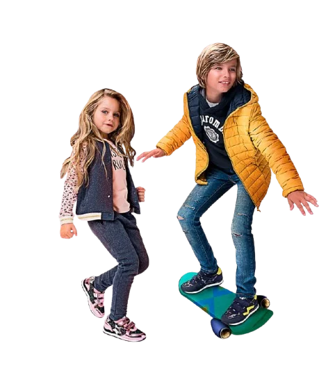 Stedrino Kids Wear 3 Stedrino homepage hero image of a girl and a boy on a skateboard in winter outfits